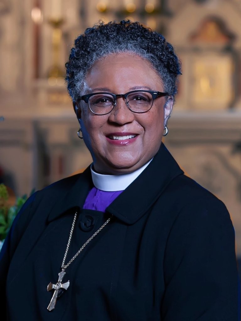 Bishop Phoebe Roaf in front of the altar at St. Mary's Cathedral, Memphis