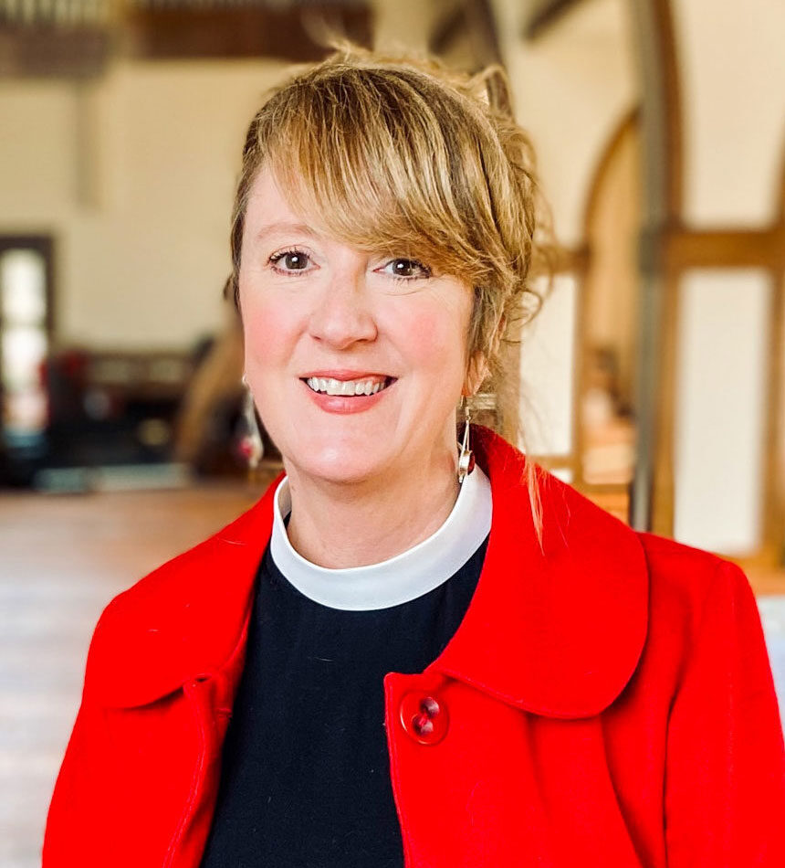 The Rev. Lisa McIndoo in the nave of Holy Apostles